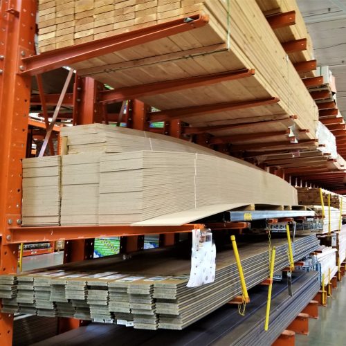 Construction! Shelves of lumber in various sizes, used in building and construction.